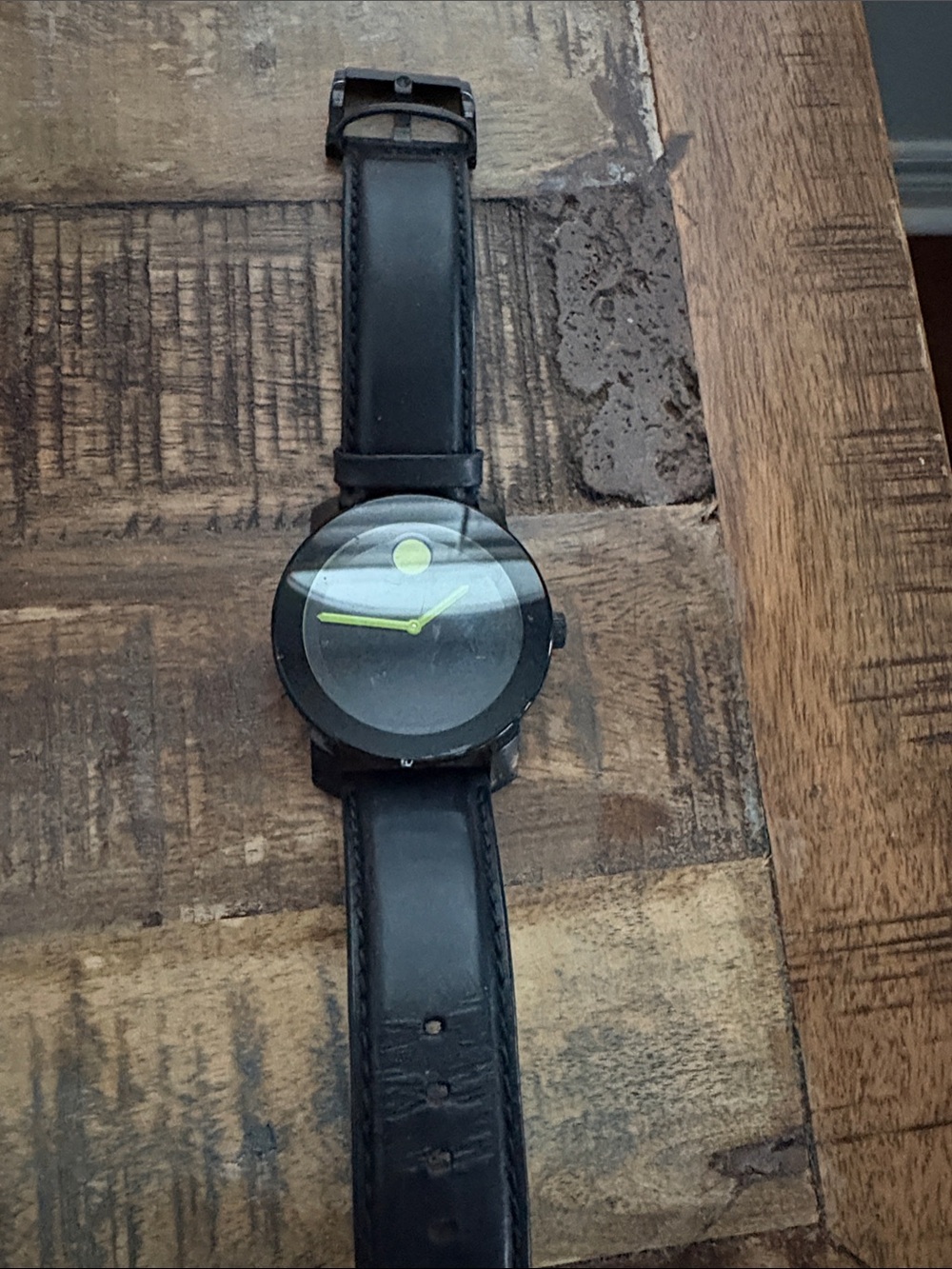 Movado Black Watch with Yellow Accent